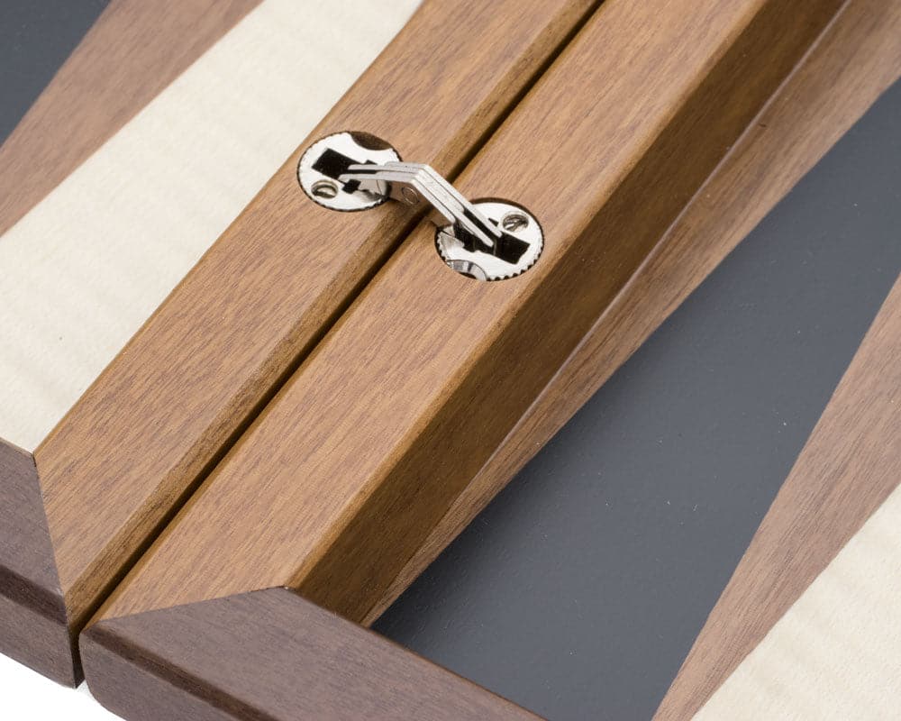 Close-up of Dal Negro Walnut Deluxe Backgammon Set showing hidden hinge and geometric pattern.