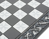 Detailed view of 17.7 inch Templar hand-painted solid resin chess board with embossed relief designs and intricate patterns, Florence, Italy.