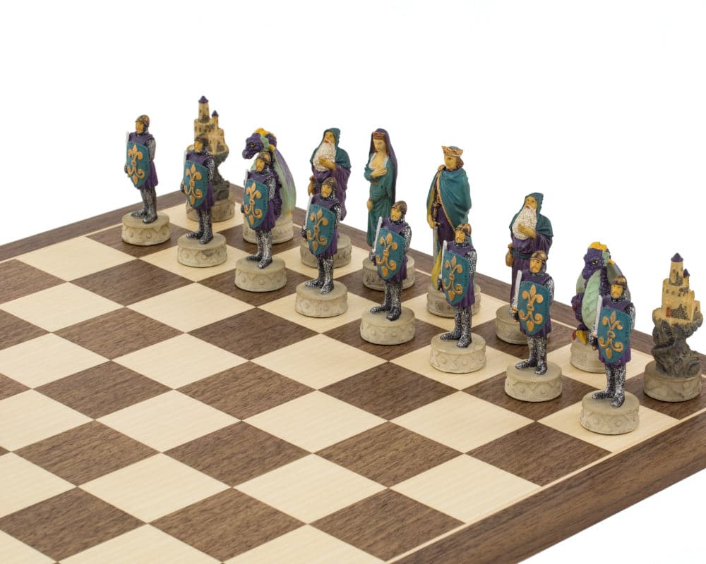 Medieval hand-painted chess pieces by Italfama arranged on a chessboard, featuring intricate designs and luxurious cloaks, ideal for a 16 inch board.