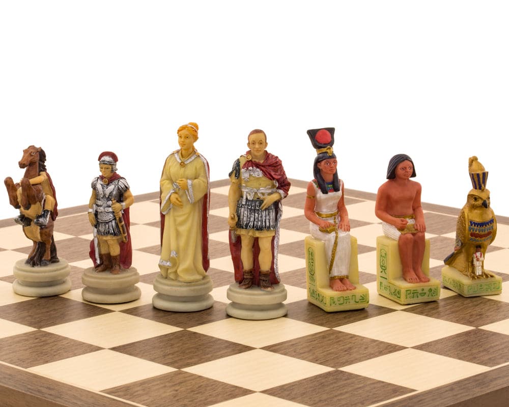 Hand-painted Romans vs Egyptians themed chess pieces by Italfama on a chessboard. Made in Italy with superb detail and craftsmanship.