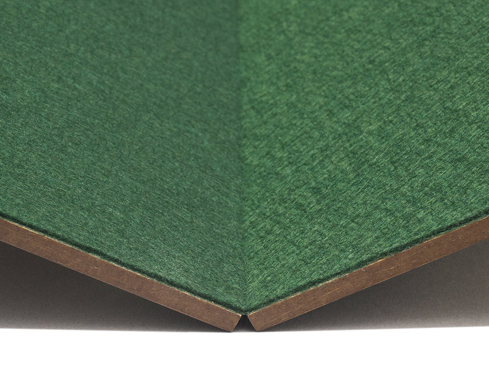 Close-up of the hinge on a 16.75-inch folding walnut chess board with a green billiard cloth base.