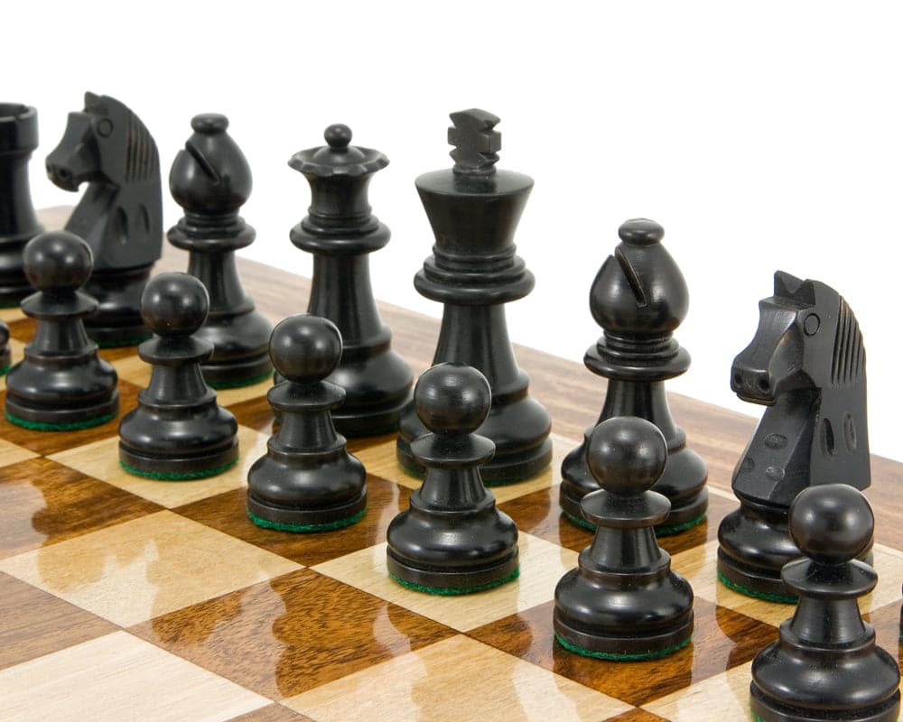 Down Head Knight Ebonised Staunton Chess Pieces 2.5 Inches displayed on a chessboard, classic design and single weighted.