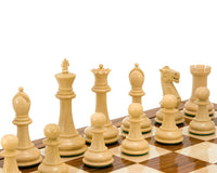 Victoria Series Sheesham and Boxwood Chessmen 3.75 Inches lined up on Sheesham chessboard.