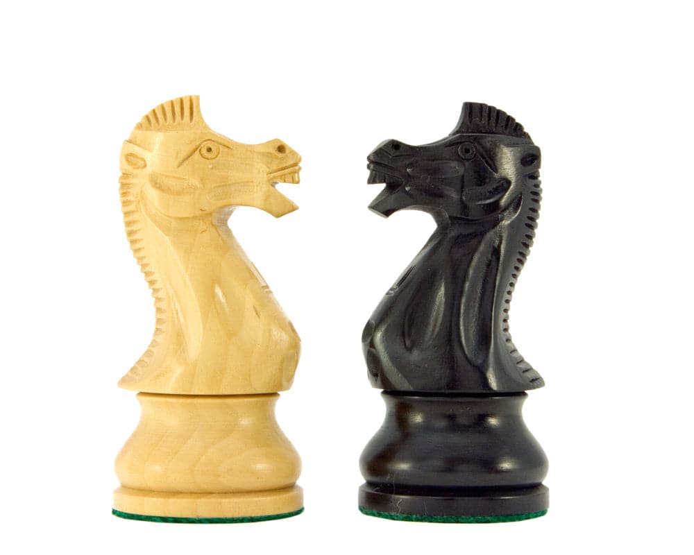 Ebonised boxwood chess knight pieces from Frankfurt Series with intricate design showing one natural boxwood and one ebonised piece.