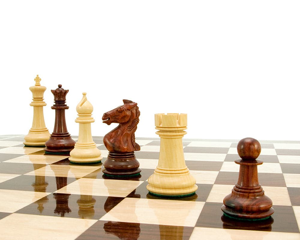 Luxury Madrid Series Rosewood chess pieces on a polished board with 4-inch king and finely carved, balanced design.