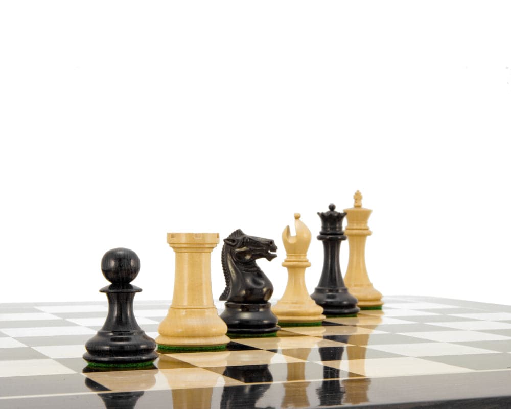 Sovereign Series Ebonised Boxwood Chessmen on Chess Board with Knight and King Pieces