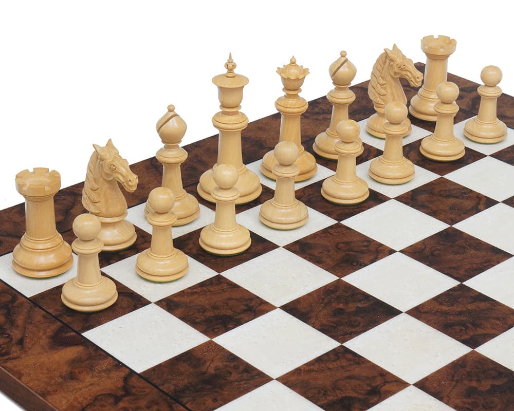 Rosewood Staunton chess pieces on a chessboard with intricate detailing, showcasing luxury and high-quality craftsmanship.