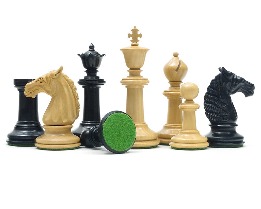 Traditional Staunton Ebony Bath Chessmen set with hand-carved solid ebony and boxwood pieces, featuring a 3.75-inch king and felted bases.