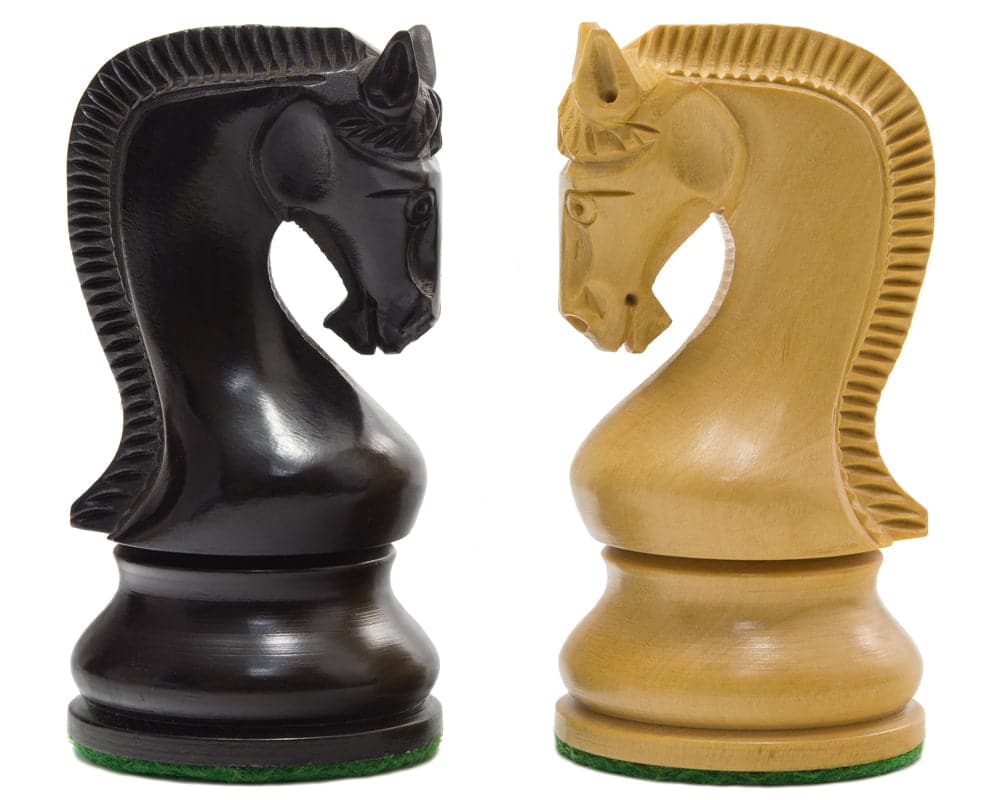 Detailed ebony and boxwood knight chess pieces from the Leningrad Series Ebonised Chess Men set.