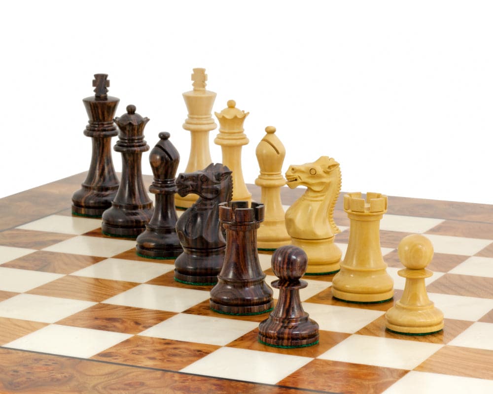 Rosewood Staunton Deluxe Chessmen 3.75 inch set displayed on chessboard, showcasing hand-crafted, weighted and felted pieces with two additional queens.