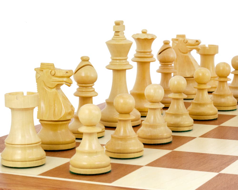 Close-up of Leningrad Anjan Chess Men on a walnut and maple chessboard, showcasing intricately crafted chess pieces.