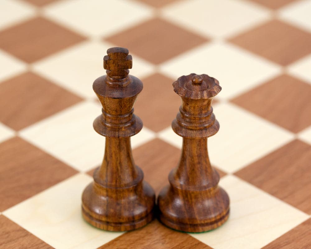 Leningrad Anjan chess men on maple and walnut board with 1.6 inch playing squares crafted in Italy.