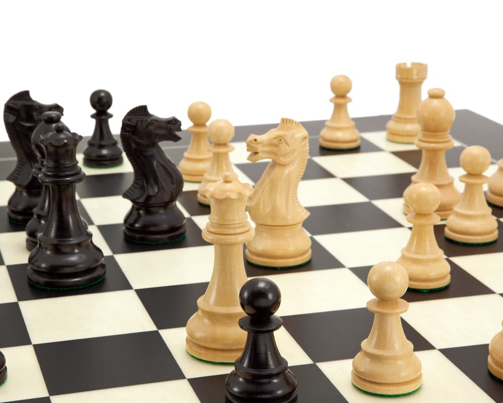 Frankfurt Grand Black Chess Set with classic Staunton design pieces on a 22-inch Spanish board, showcasing beautifully carved and hand-turned pieces.