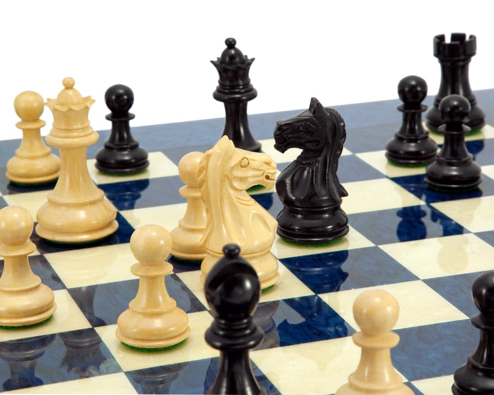 Fierce Knight Blue Chess Set featuring handcrafted ebony and boxwood chessmen on an Italian blue-stained erable veneer chess board.