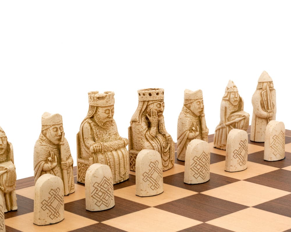 Detailed Isle of Lewis chess pieces on European walnut and maple chess board.