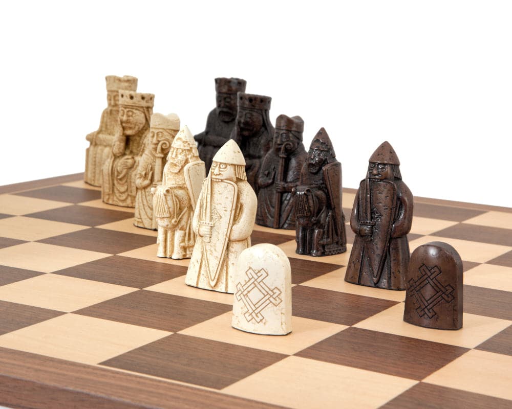 The Isle of Lewis Walnut and Maple Chess Set with legendary Isle of Lewis chessmen on a European walnut chess board.