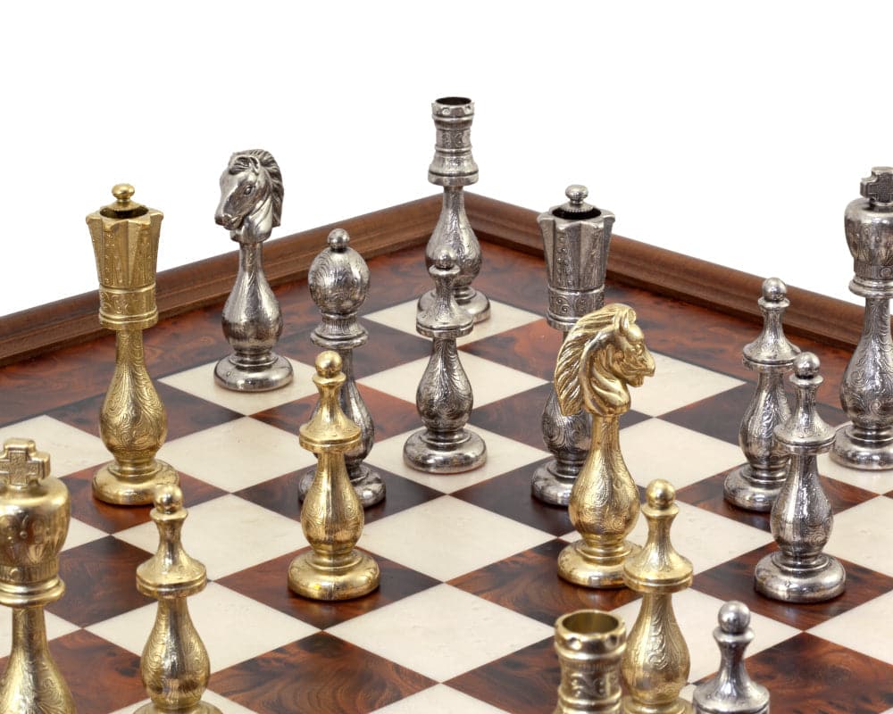 Maghreb Brass and Briarwood Chess Cabinet with metal chess pieces on display