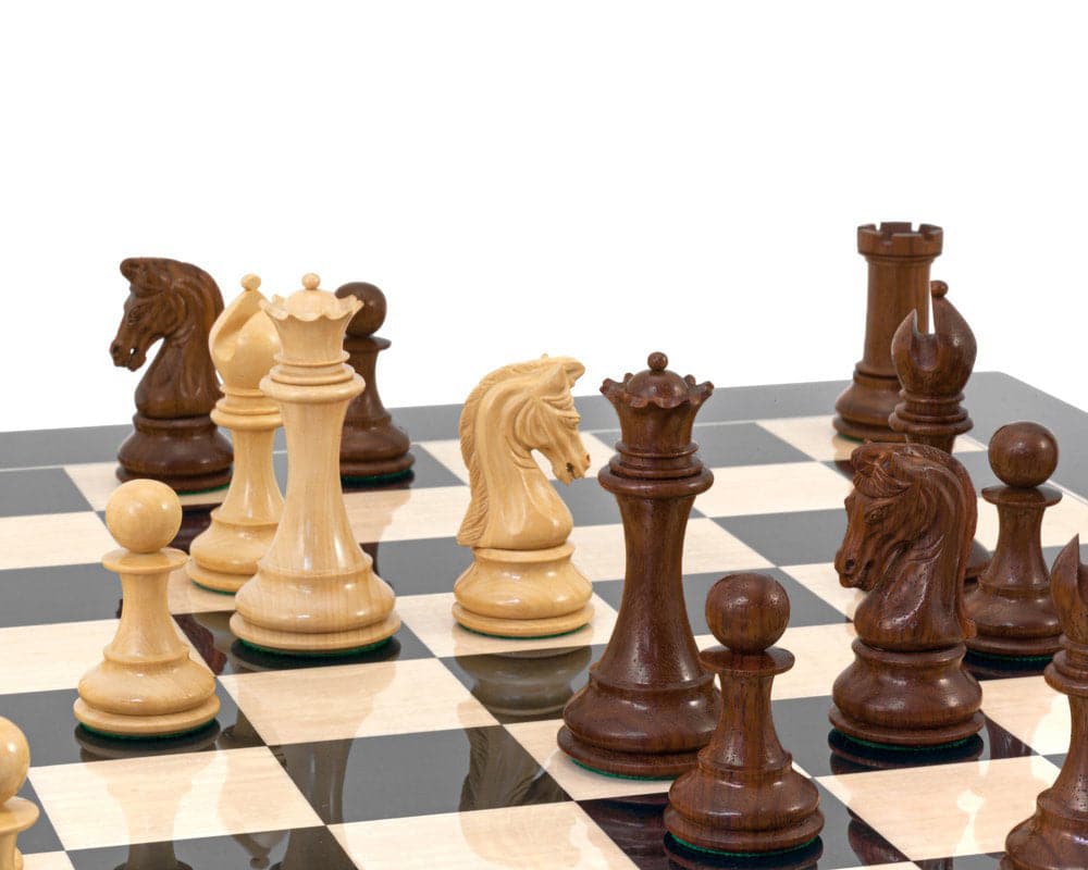 Handcrafted Rosewood and Maple Staunton chess pieces on a high gloss black anegre chess board