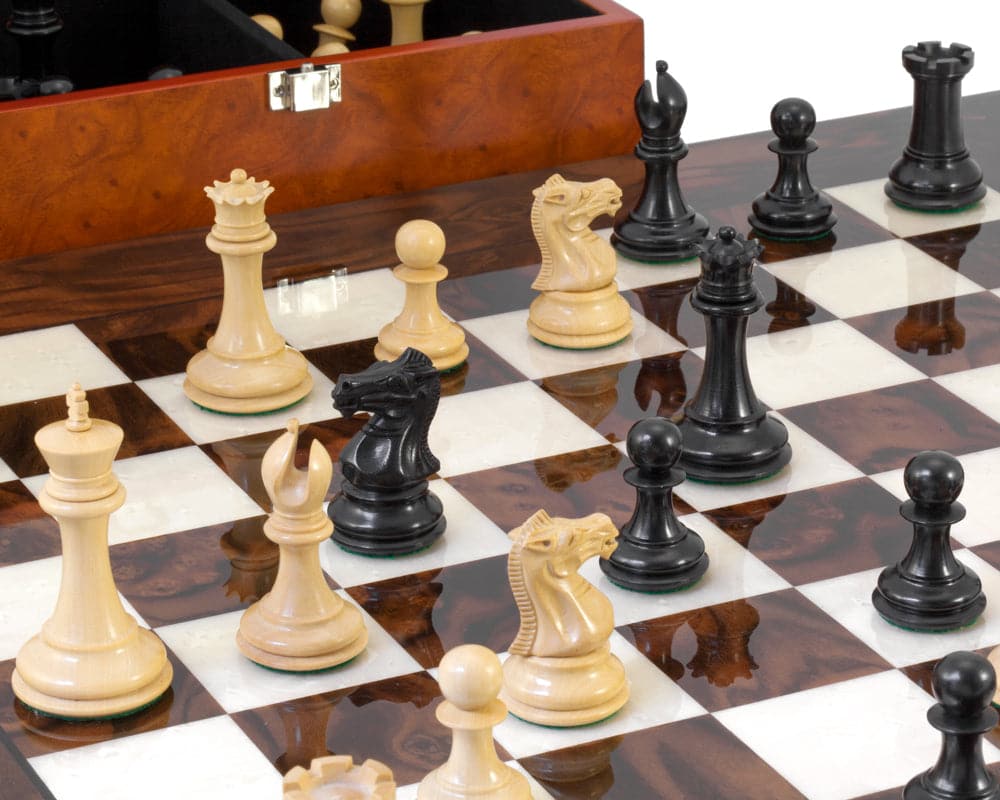 Luxury Staunton chess pieces set on an Italian hardwood chess board, featuring beautifully handcrafted Ebony and natural wood pieces.