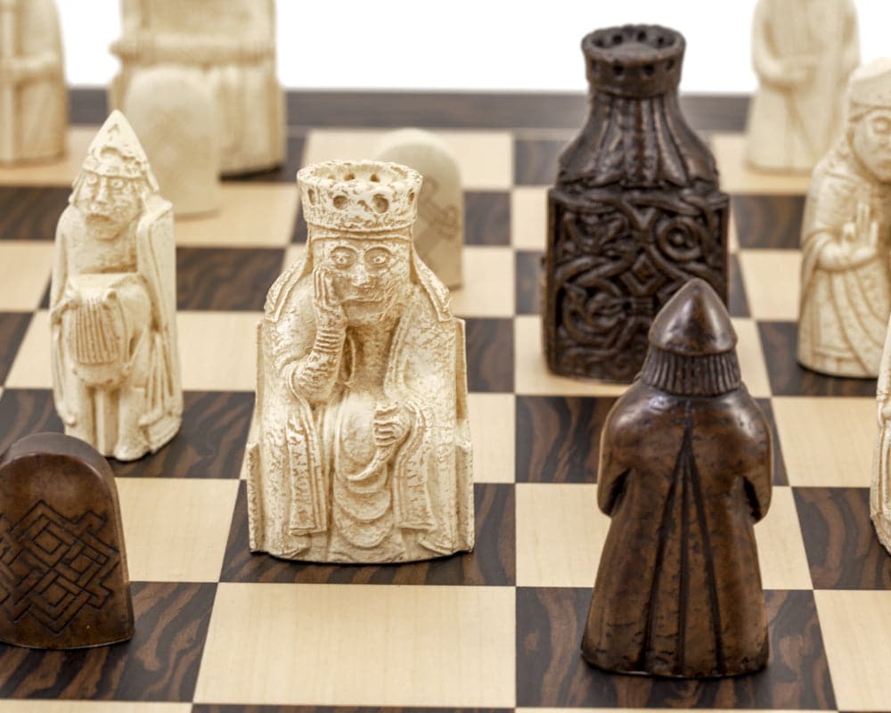 Isle of Lewis chess pieces on tiger ebony and maple chess board by Regency Chess Company