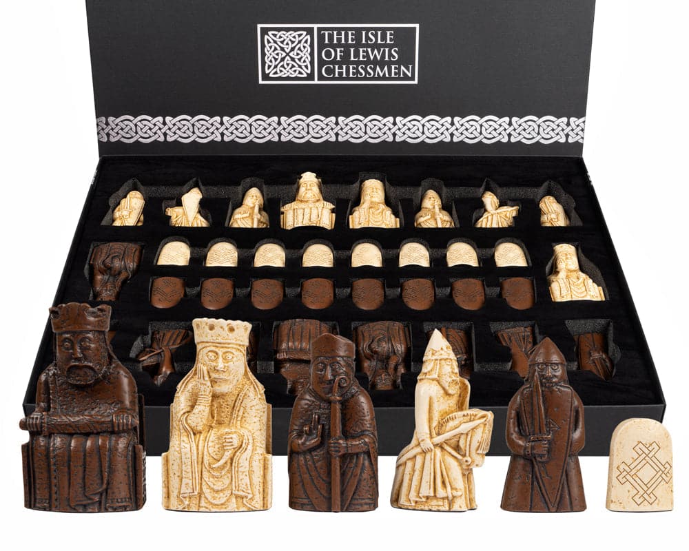 The Isle of Lewis Chessmen set in a display box with detailed historical chess pieces sculpted from scientific laser scans.