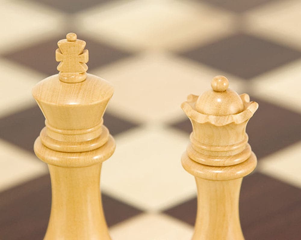 Handcrafted Windsor Series Staunton King and Queen chess pieces on Montgoy Palisander chessboard.