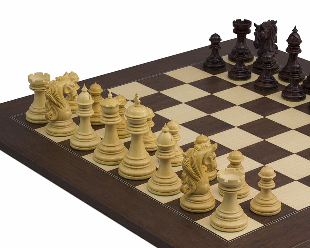 The Kingsgate Rosewood Palisander Chess Set on a 21.7 inch Spanish board displaying ornately detailed pieces including knights and kings.