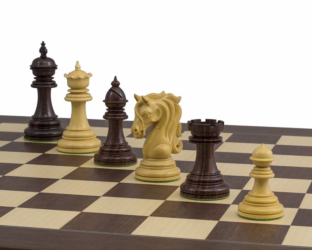 The Kingsgate Rosewood Palisander Chess Set featuring ornately detailed handcrafted pieces on a luxurious Spanish board