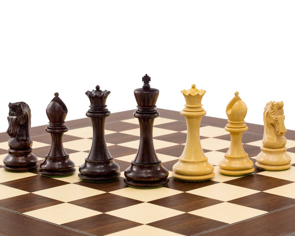 The Eminence Rosewood Palisander Deluxe Chess Set with intricately detailed pieces on a chessboard including a 4.75-inch king and hand-carved knight.