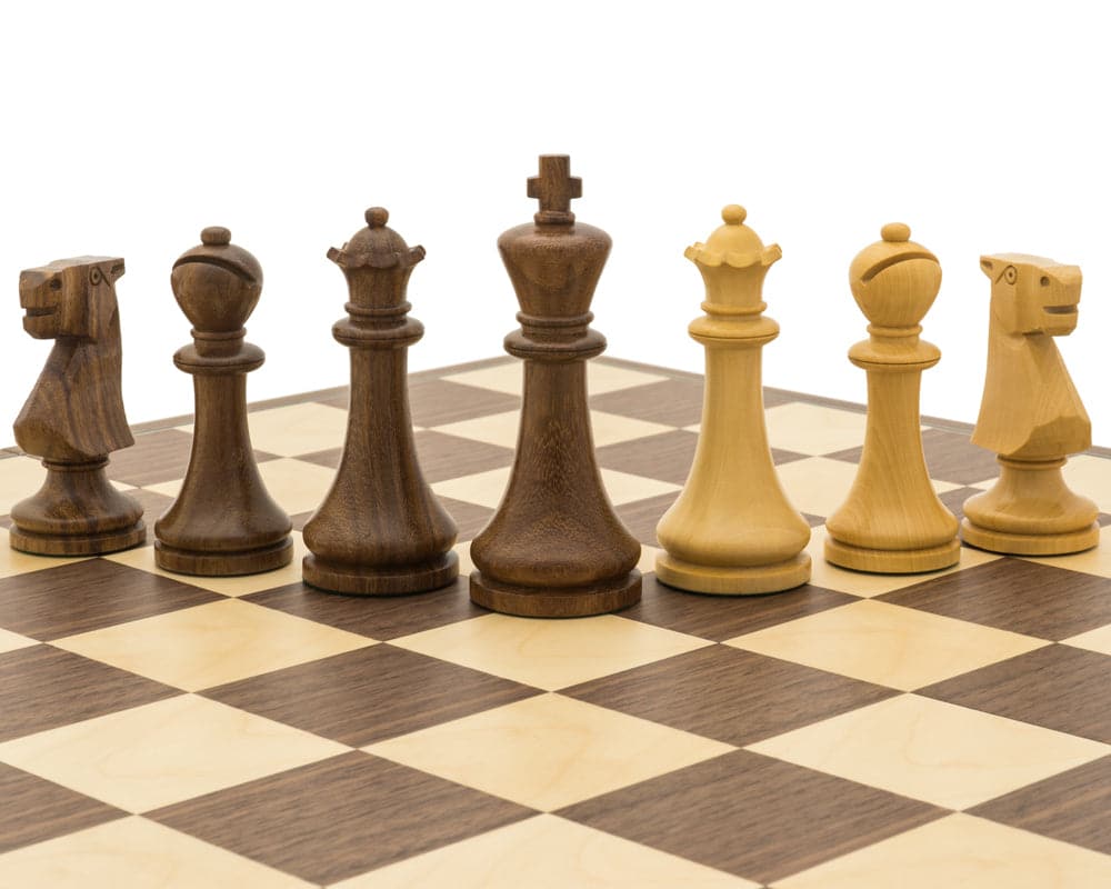 The Pioneer Golden Rosewood and Walnut folding chess set pieces on a wooden board.