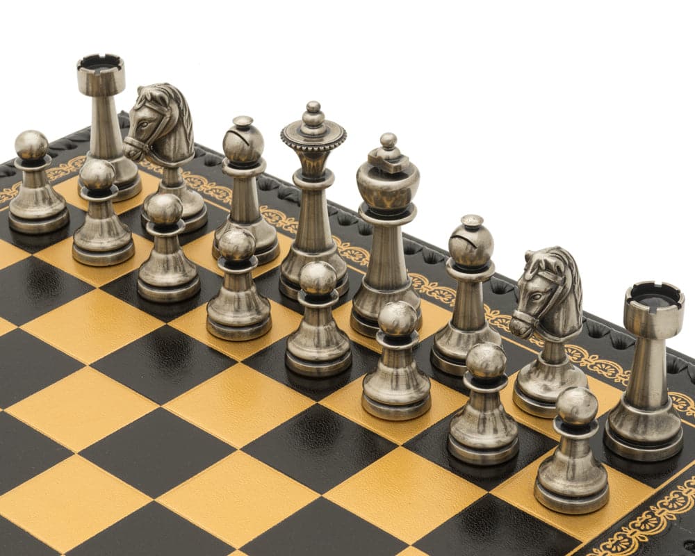 Elegant Turin Nero Italian Chess Set featuring metallic Staunton pieces on a black and gold checkered chessboard.