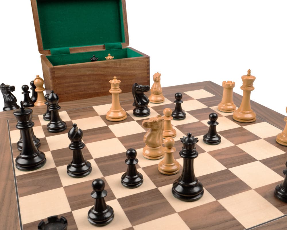 1869 Reproduction Staunton Ebony and Walnut Chess Set with handcrafted pieces on deluxe board and wooden storage box.