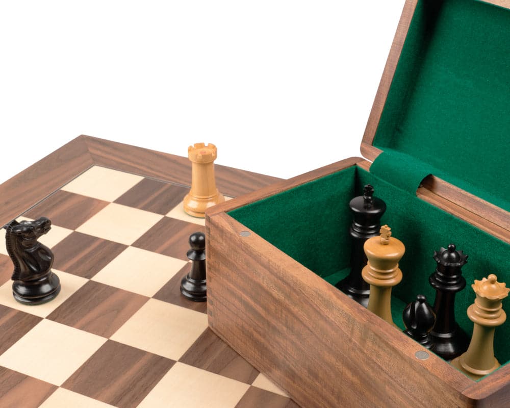 The 1869 Reproduction Staunton Ebony and Walnut Grand Luxury Chess Set with handcrafted chess men and deluxe wooden storage box.