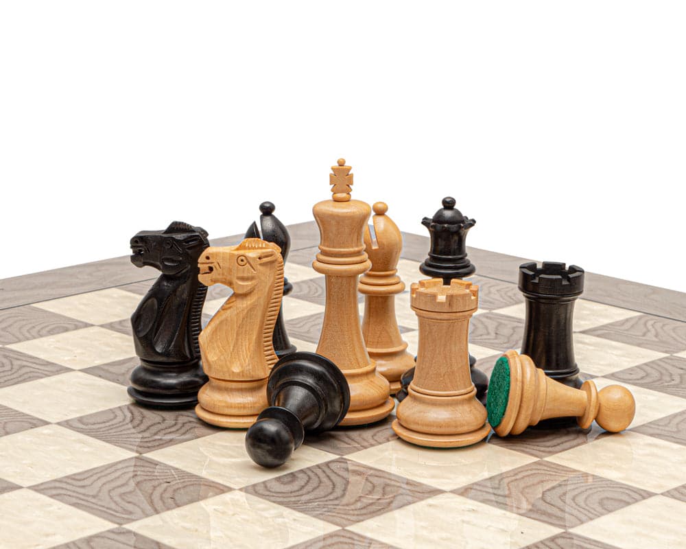 The Victoria Black and Grey Ash Burl Classic Chess Set on 19.7 inch Spanish board with weighted and felted boxwood chess pieces.