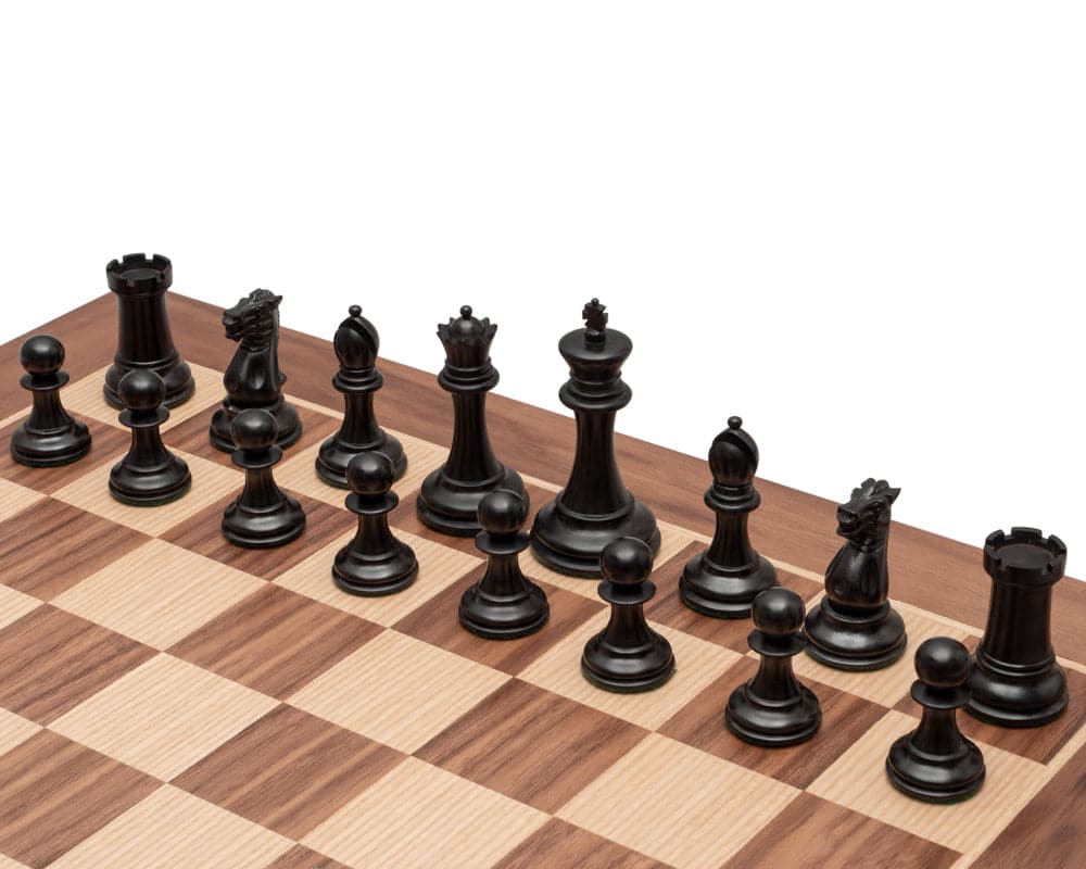 The Old English Elite Walnut and Black Deluxe Chess Set with classic Staunton ebony pieces on a walnut and maple veneer board