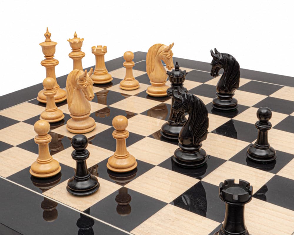 The Blackburne Ebony and Black Anegre Chess Set featuring handcrafted ebony and anegre pieces on a 23.6 inch luxury board.